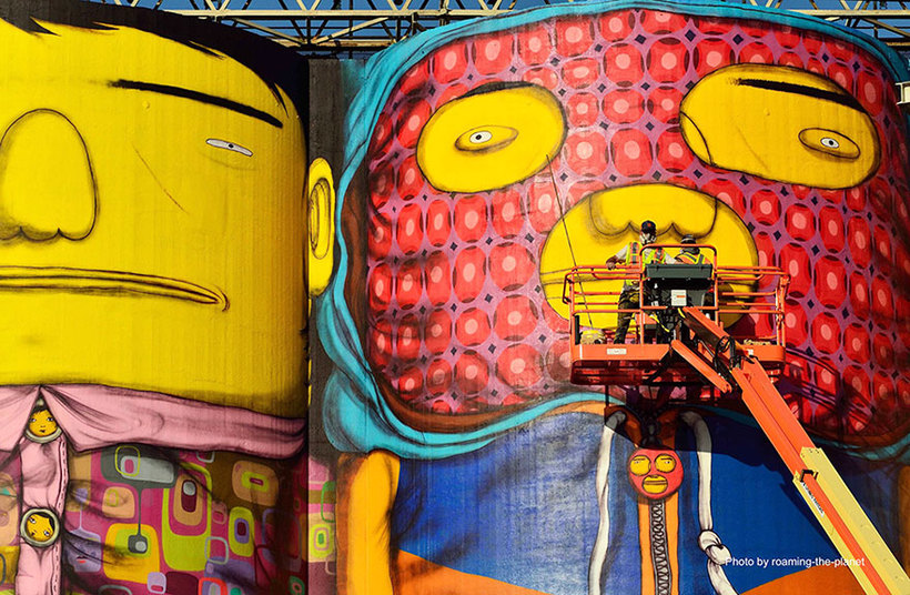 Блог - Как близнецы Os Gemeos раскрасили индустриальный бункер Ванкувера Как близнецы Os Gemeos раскрасили индустриальный бункер Ванкувера